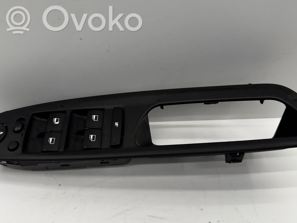 o-8b88556451fd7d0d558a5fc7ee98f97e-bmw_x5_e70______________________________ BMW X5 E70 Interrupteur commande lève-vitre 9218044 HW06SW07 12W36A1205 – Image 1